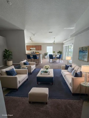 a living room with furniture and a couch