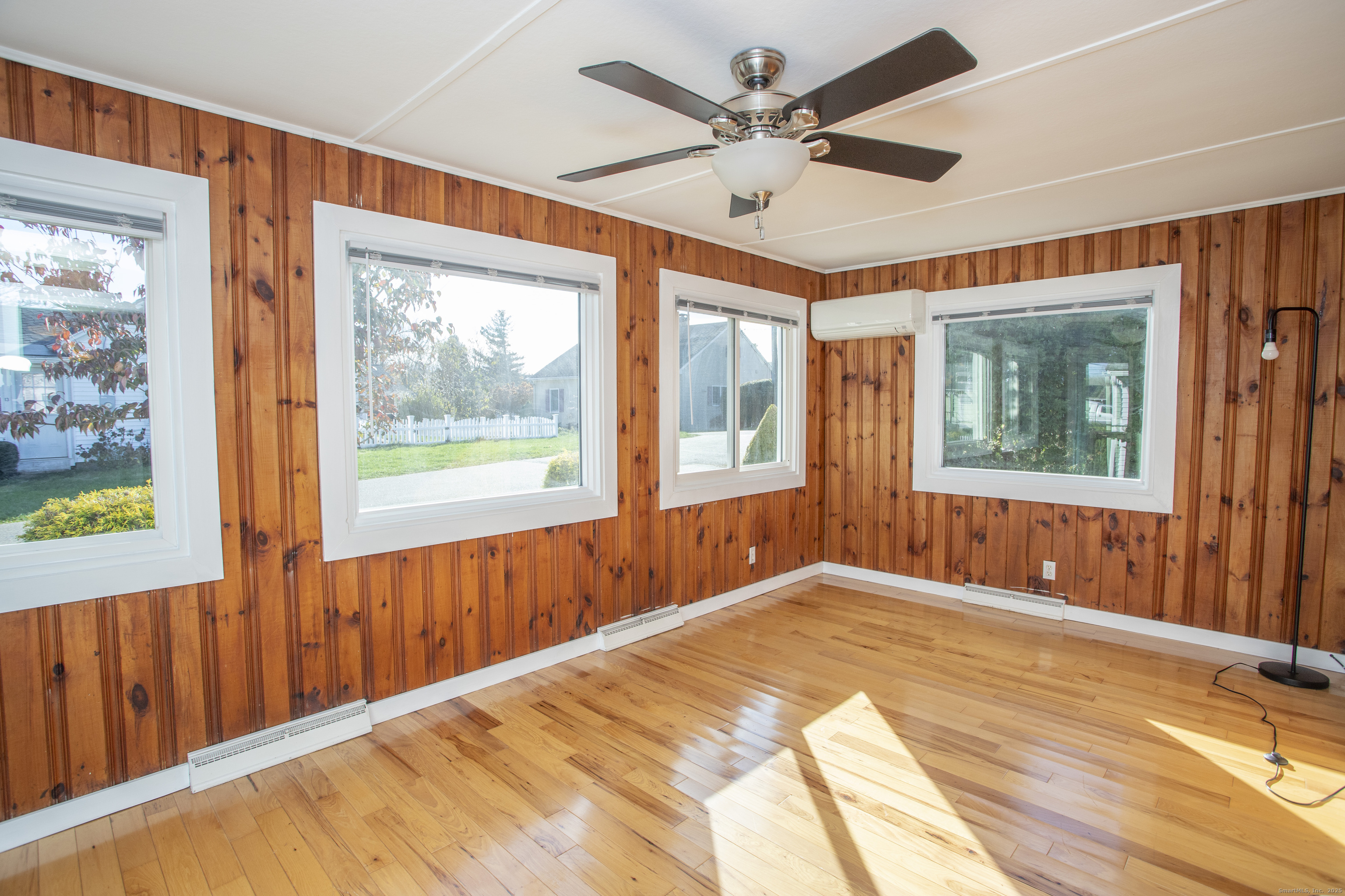 10 Dorothy Road Westbrook, CT 06498 - Photo 11 of 25 a bedroom with a large bed and a window