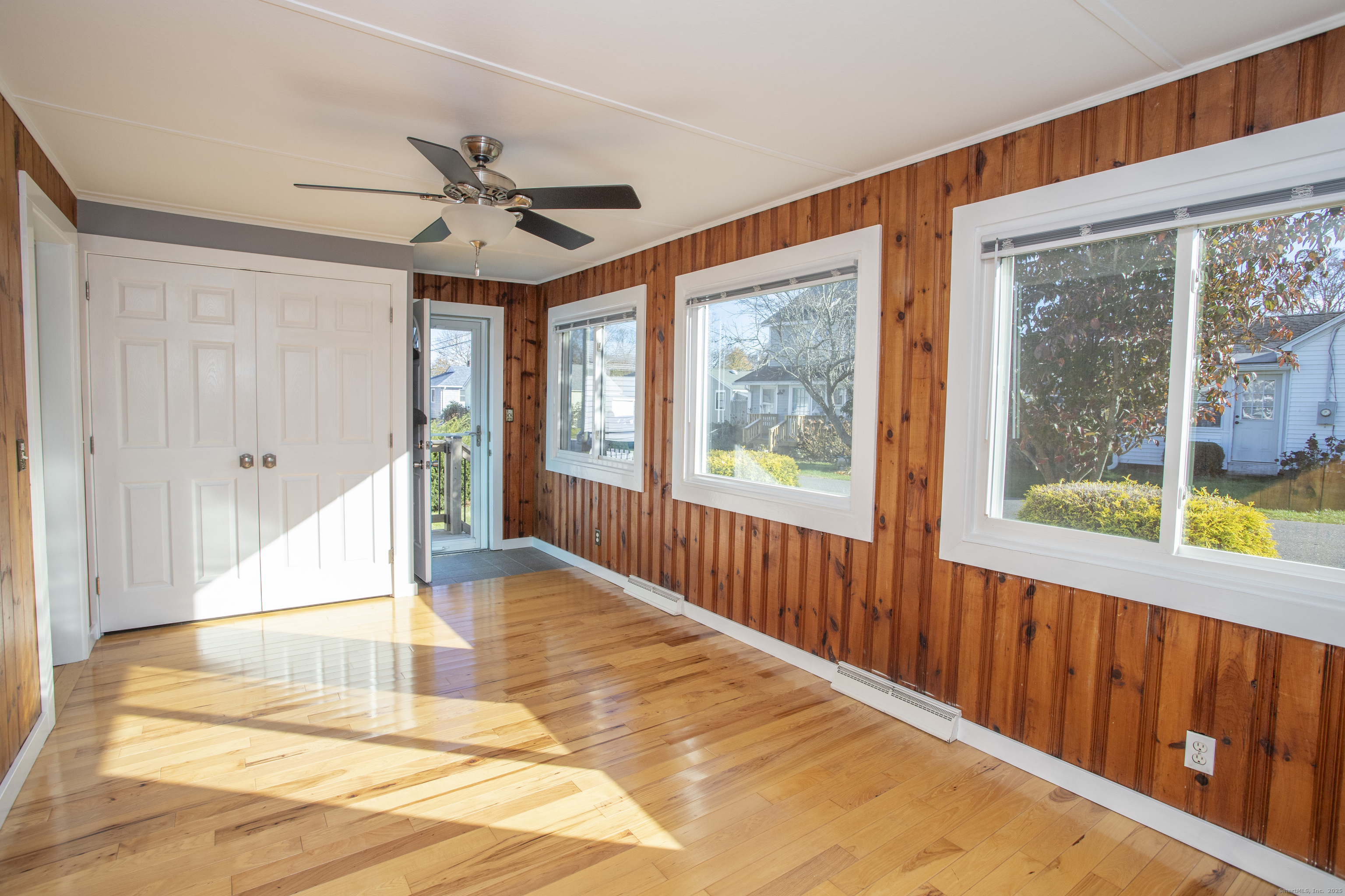 10 Dorothy Road Westbrook, CT 06498 - Photo 14 of 25 a view of a room with wooden floor and windows