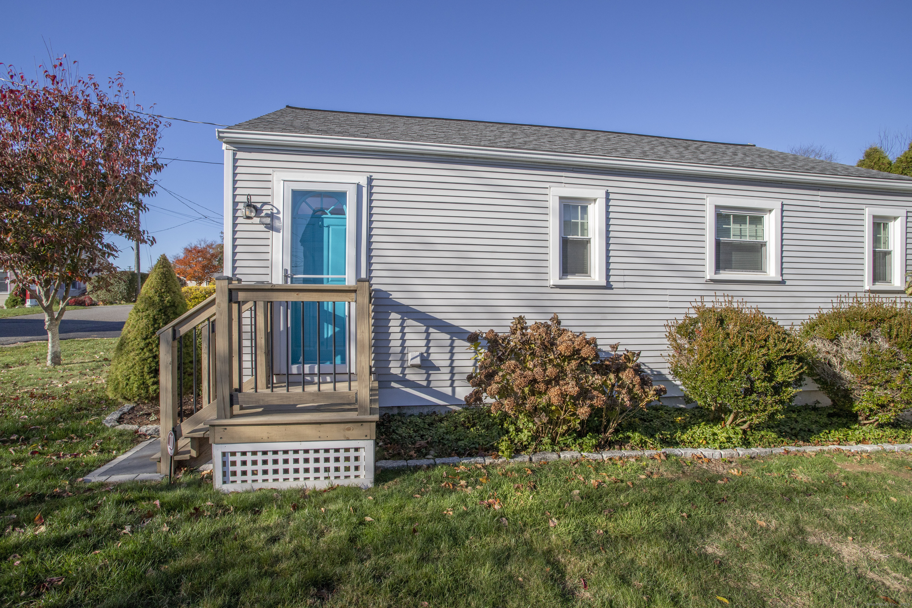 10 Dorothy Road Westbrook, CT 06498 - Photo 2 of 25 front view of a house with a garden