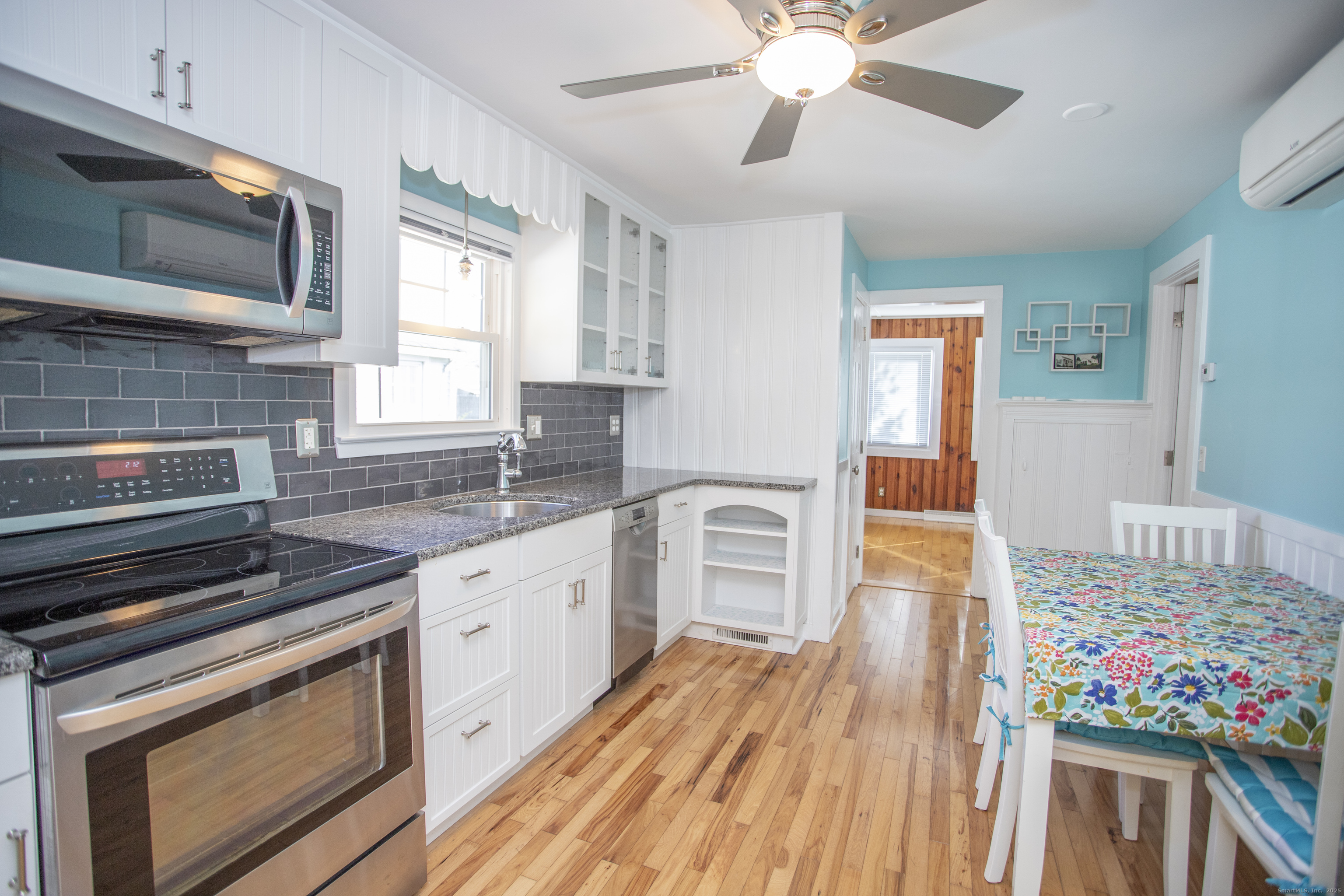 10 Dorothy Road Westbrook, CT 06498 - Photo 7 of 25 a kitchen with stainless steel appliances granite countertop a stove and cabinets