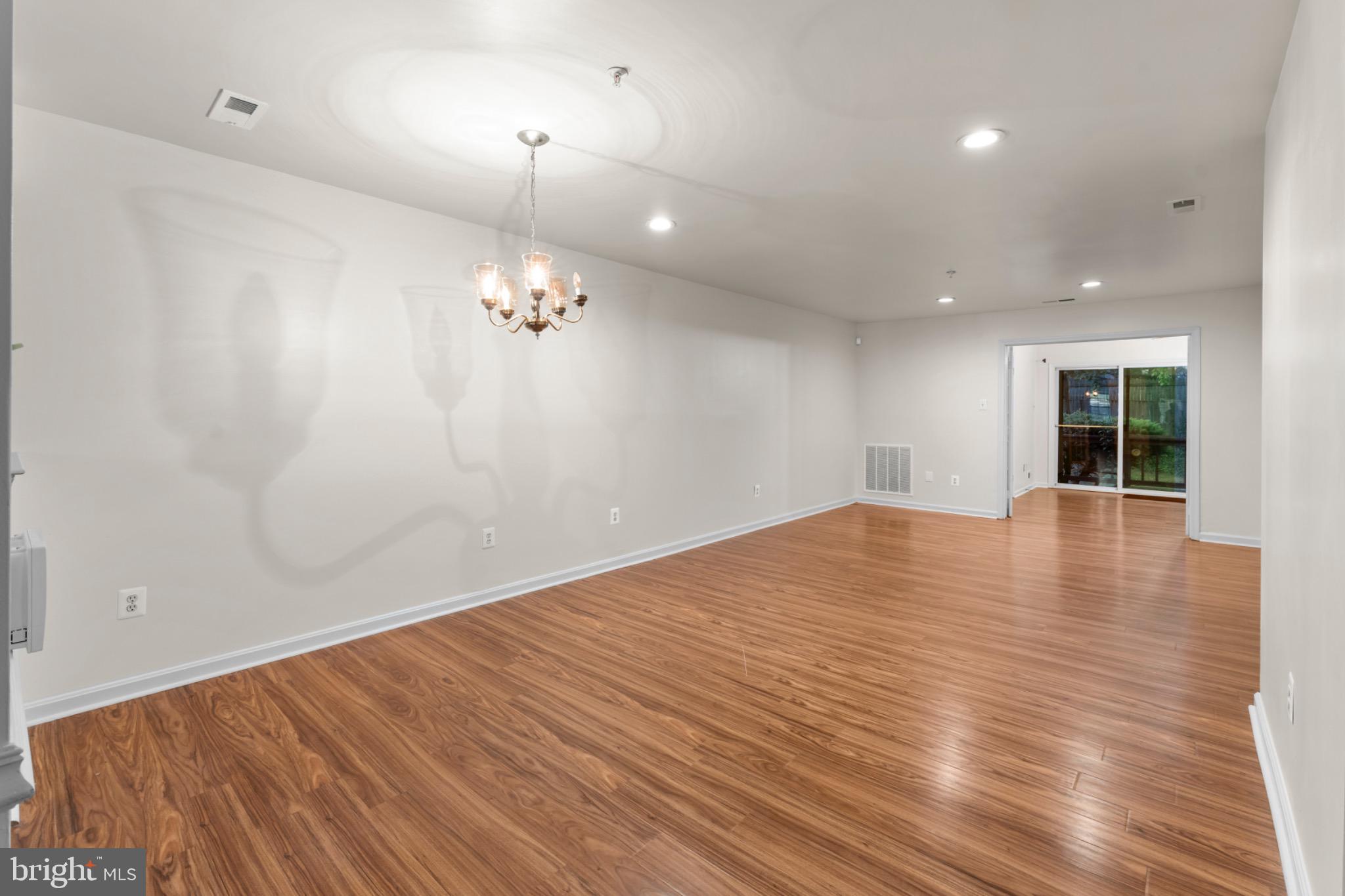 9266 Cherry Lane, Unit 51 Laurel, MD 20708 - Photo 7 of 23 Spacious, sunlit room with elegant charm.