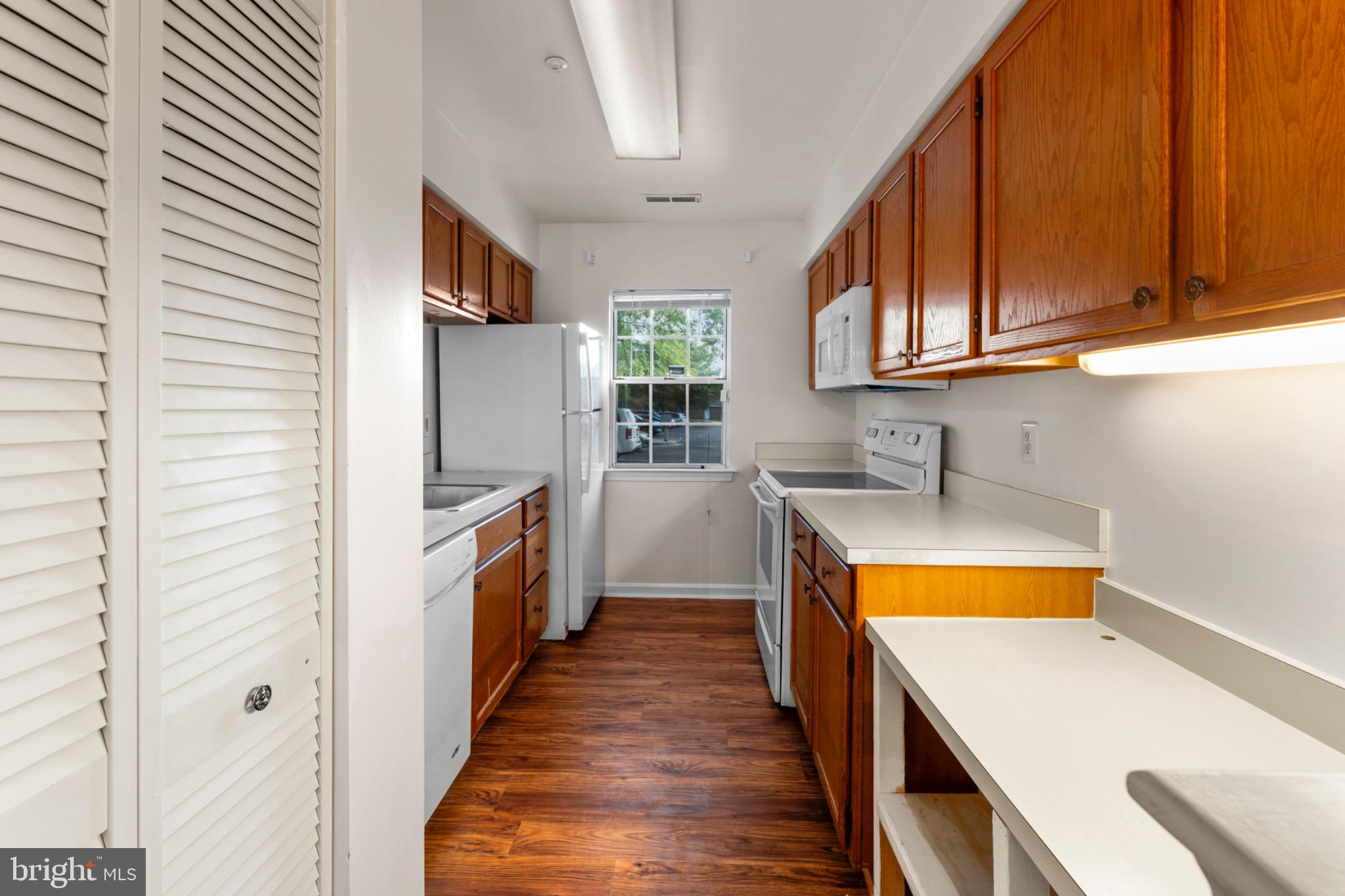9266 Cherry Lane, Unit 51 Laurel, MD 20708 - Photo 9 of 23 Bright and inviting kitchen with modern finishes.