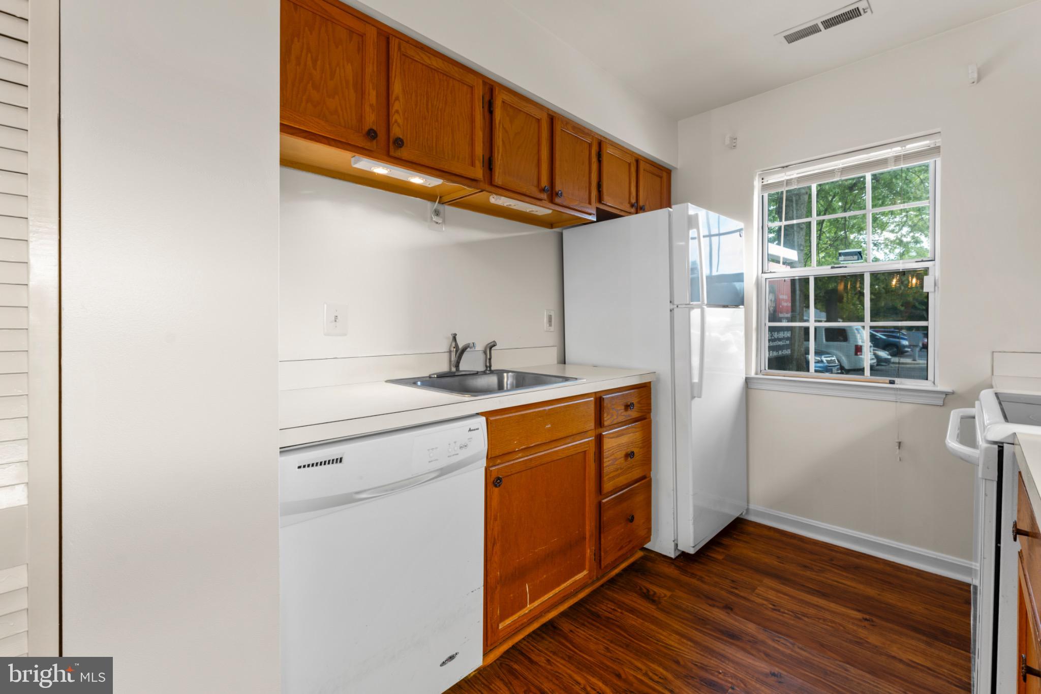 9266 Cherry Lane, Unit 51 Laurel, MD 20708 - Photo 10 of 23 Bright and inviting kitchen with modern finishes.