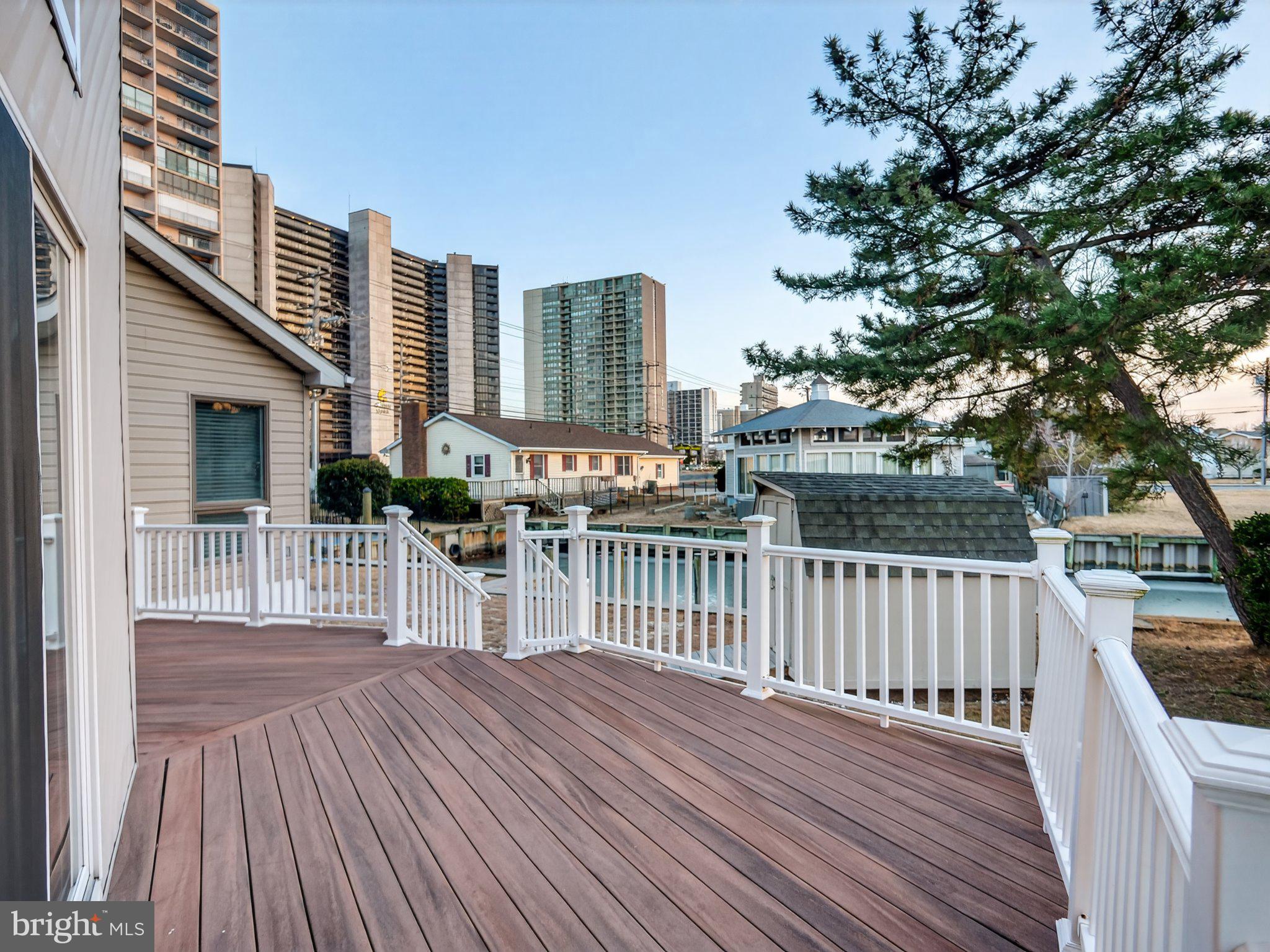103 Channel Buoy Road Ocean City, MD 21842 - Photo 7 of 29 Charming deck with urban skyline views.