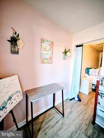 a living room with table and chair