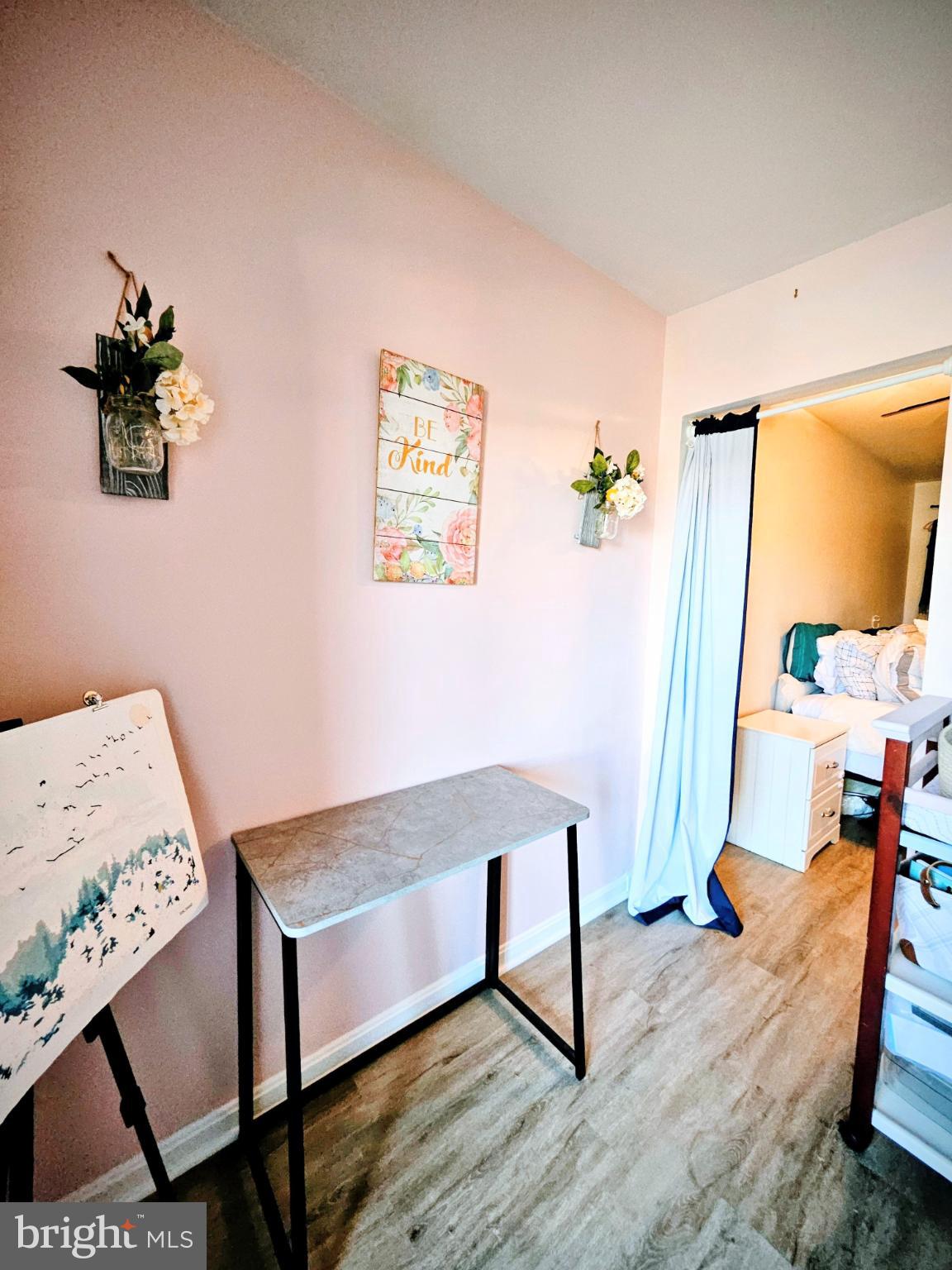 9200 Azure Court, Unit 201 Manassas, VA 20110 - Photo 16 of 20 a living room with table and chair