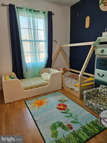 a living room with a rug