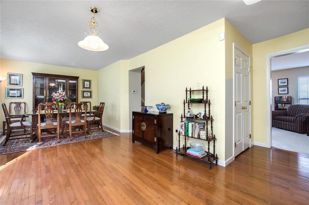 103 Park Place McKees Rocks, PA 15136 - Photo 11 of 25 Don't Miss the Gorgeous Hardwood Flooring in the Kitchen and Dining Area