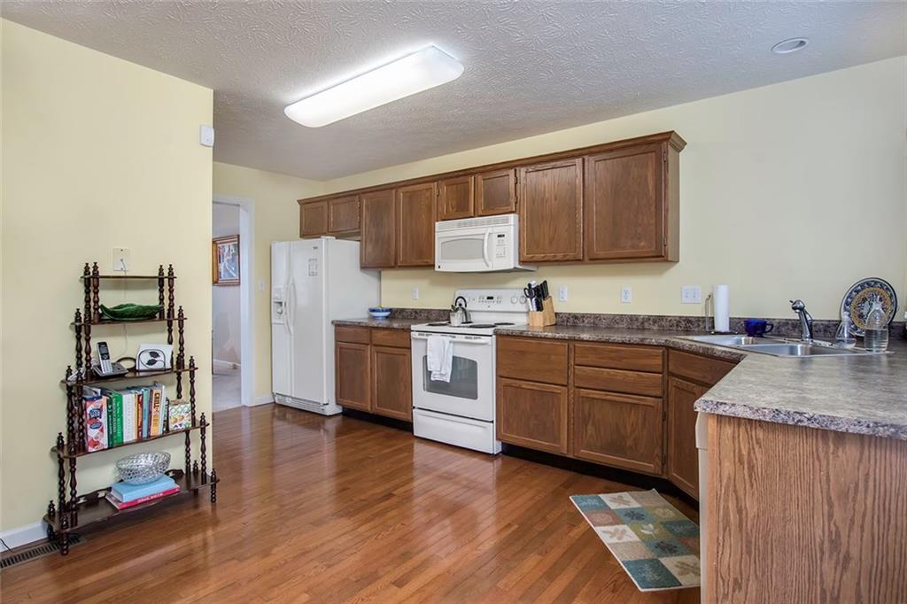 103 Park Place McKees Rocks, PA 15136 - Photo 14 of 25 You Will Love the Solid Surface Counter Tops that Mimic Granite