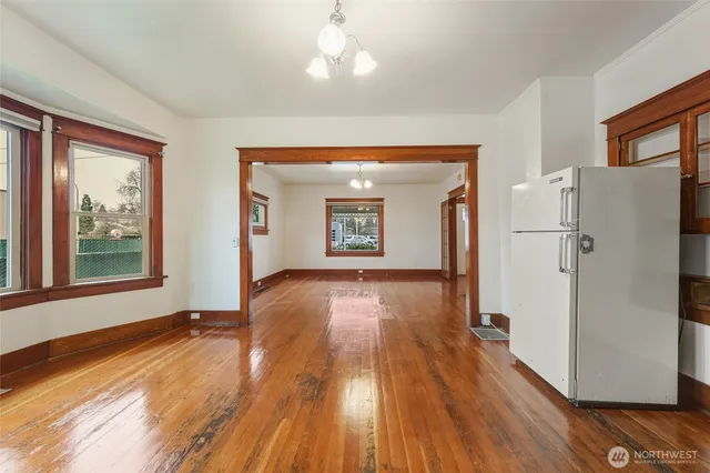 a bathroom with a bathtub a sink a toilet and a mirror