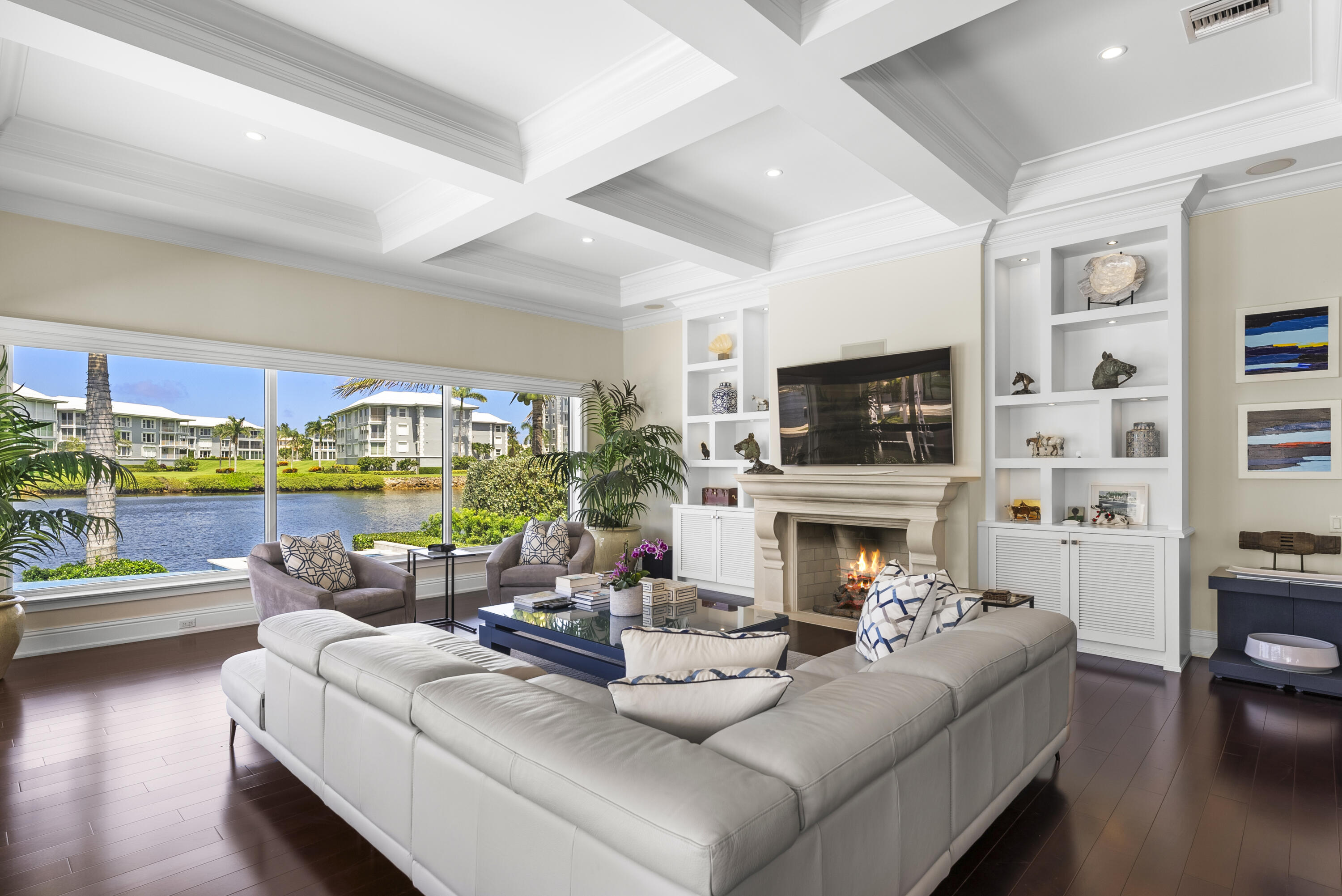 975 Banyan Drive Delray Beach, FL 33483 - Photo 49 of 66 a living room with fireplace furniture and a flat screen tv