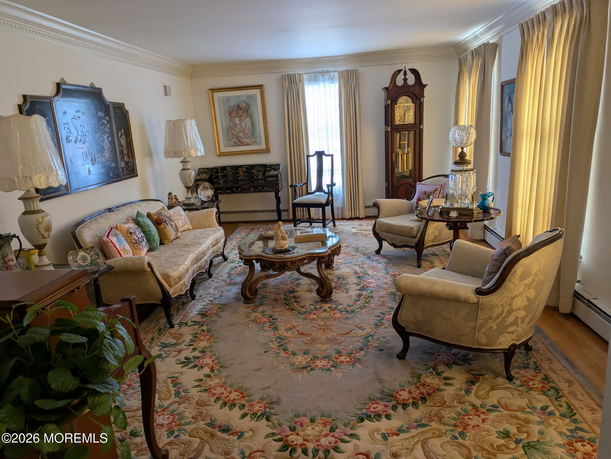 2 Seawood Way Spring Lake, NJ 07762 - Photo 2 of 6 a living room with furniture and a fireplace