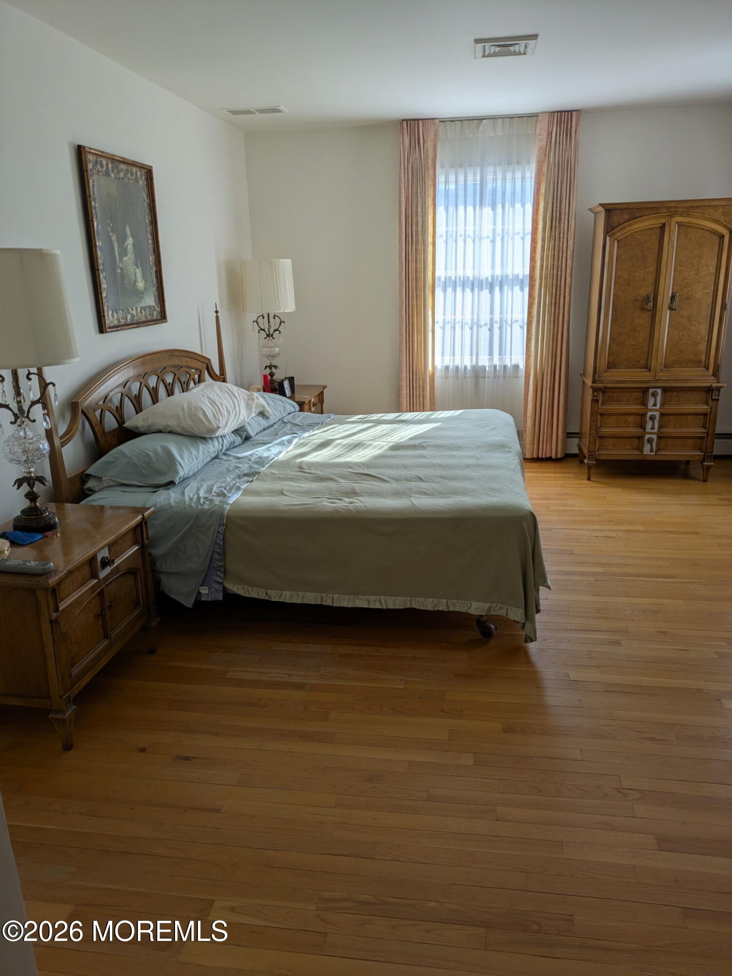 2 Seawood Way Spring Lake, NJ 07762 - Photo 4 of 6 a spacious bedroom with a bed and a dresser