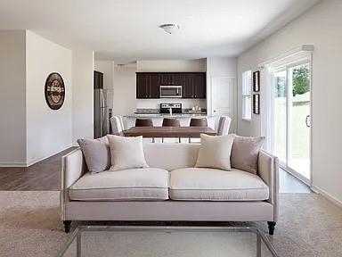 166 Verona Drive Northwest Cartersville, GA 30120 - Photo 3 of 13 a living room with furniture and a flat screen tv