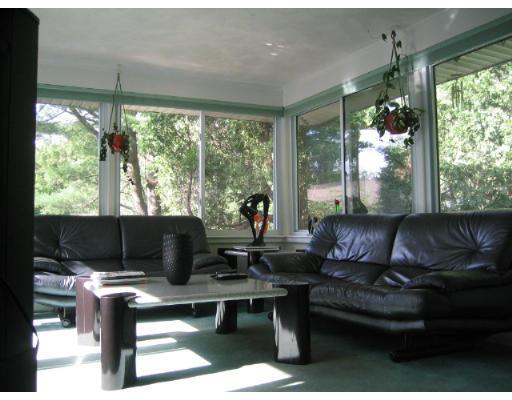 200 Crafts Road Brookline, MA 02467 - Photo 3 of 6 a living room with furniture and a large window