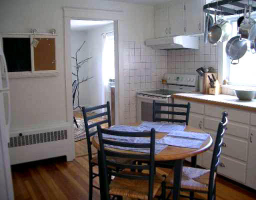 25 Hambly Road Tiverton, RI 02878 - Photo 2 of 8 a view of a dining room with furniture and wooden floor