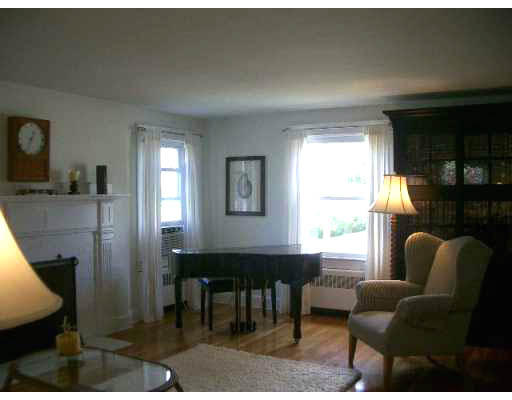 25 Hambly Road Tiverton, RI 02878 - Photo 6 of 8 a view of a livingroom with furniture and window
