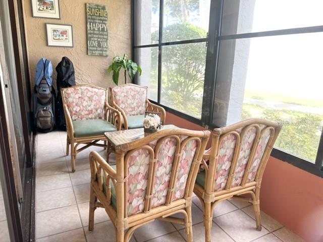 7701 Starkey Road, Unit 731 Seminole, FL 33777 - Photo 10 of 19 a view of a dining room with furniture window and outside view