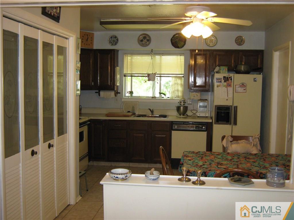 742 B Pompton Road Monroe Township, NJ 08831 - Photo 6 of 11 a kitchen with a sink and a stove top oven
