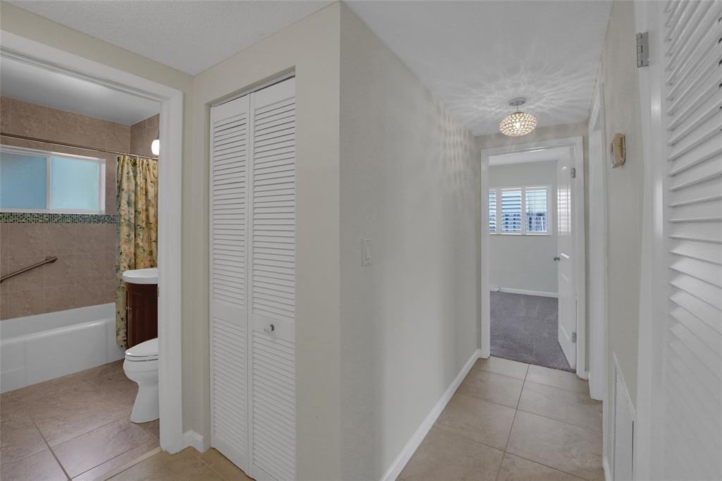 2725 Southeast 5th Court Pompano Beach, FL 33062 - Photo 14 of 37 a bathroom with a toilet and a shower