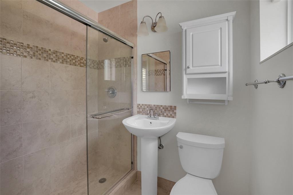 2725 Southeast 5th Court Pompano Beach, FL 33062 - Photo 18 of 37 a bathroom with a toilet sink and shower