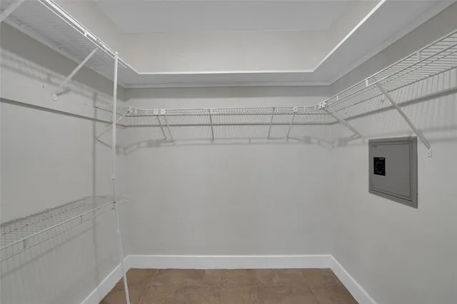 a view of an empty walk in closet