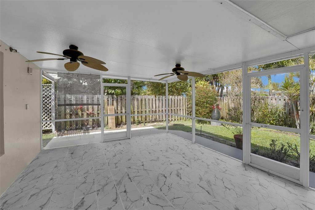 2725 Southeast 5th Court Pompano Beach, FL 33062 - Photo 28 of 37 a view of front door and porch