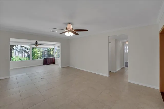 a view of livingroom with furniture and chandelier fan