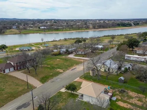 a view of a lake with a city
