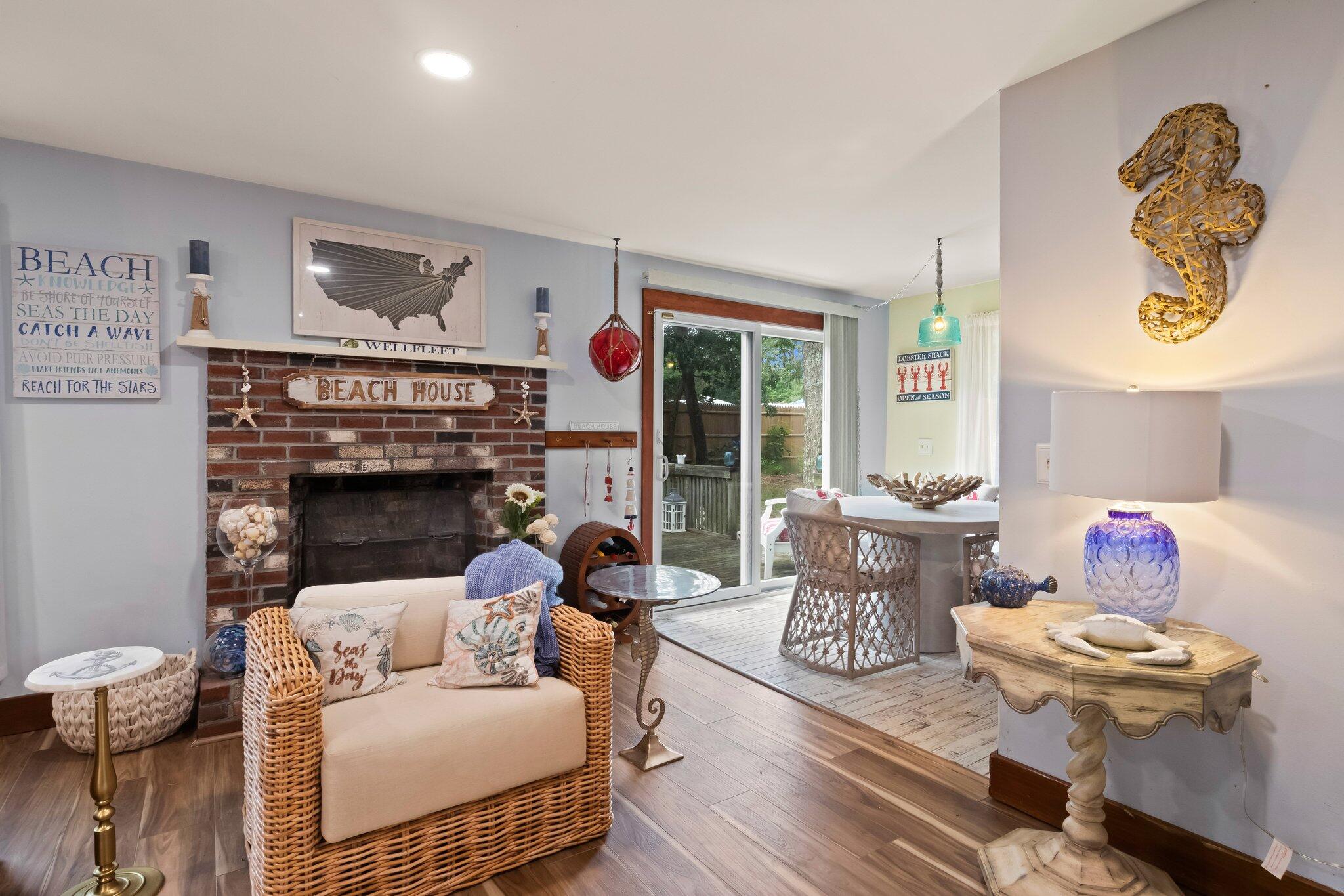 45 Designers Road Wellfleet, MA 02667 - Photo 19 of 84 a living room with furniture and a fireplace