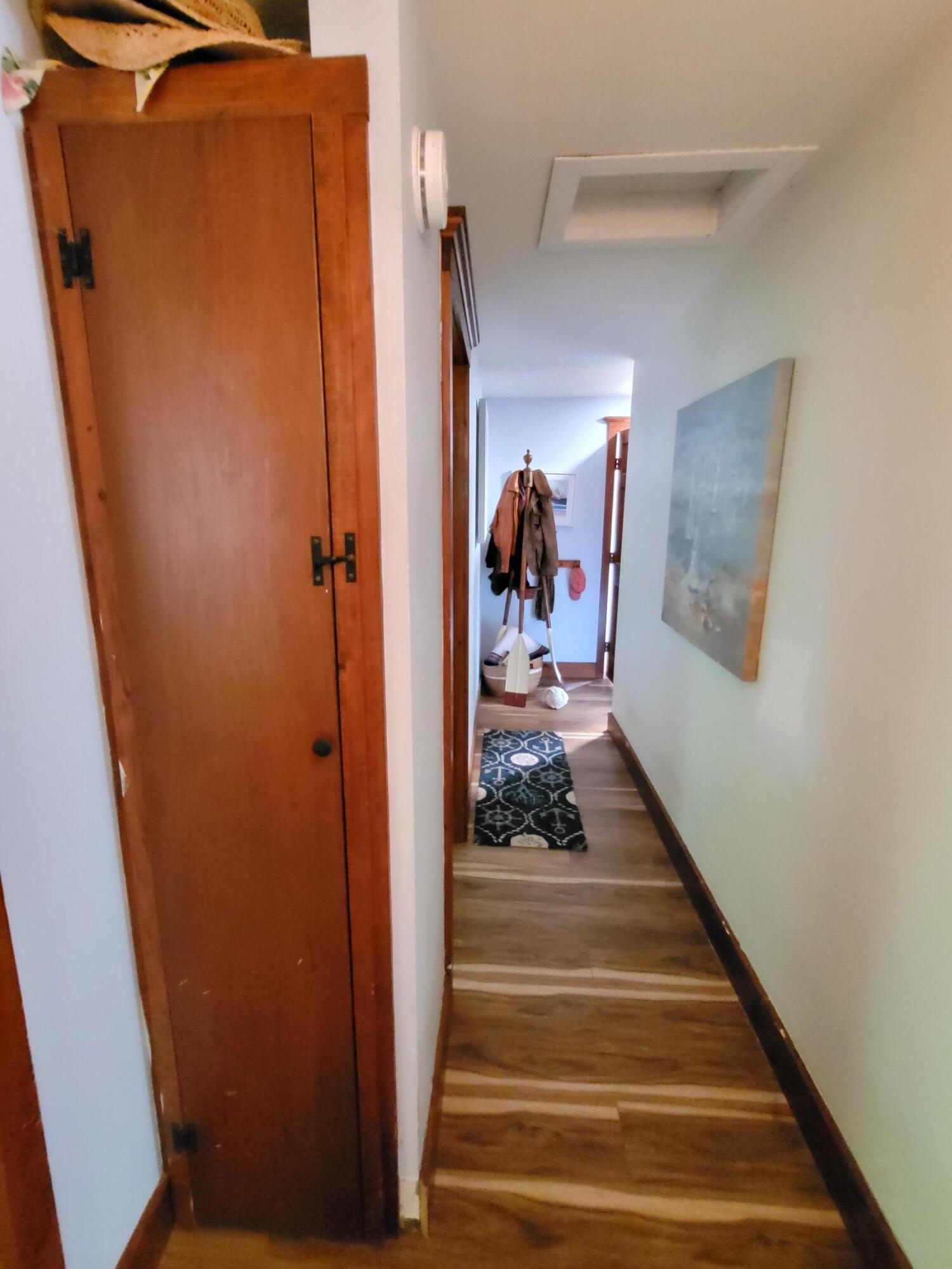 45 Designers Road Wellfleet, MA 02667 - Photo 41 of 84 a view of a hallway with wooden floor and stairs