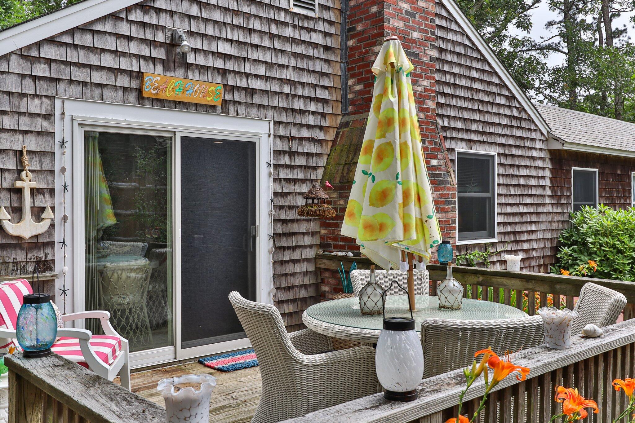 45 Designers Road Wellfleet, MA 02667 - Photo 5 of 84 a view of an outdoor sitting area with furniture