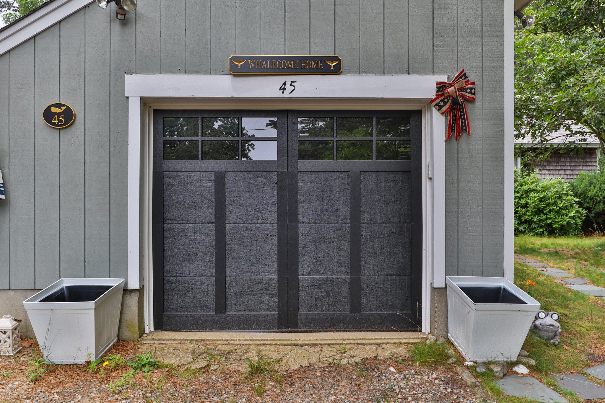 45 Designers Road Wellfleet, MA 02667 - Photo 53 of 84 a front view of a house with a yard