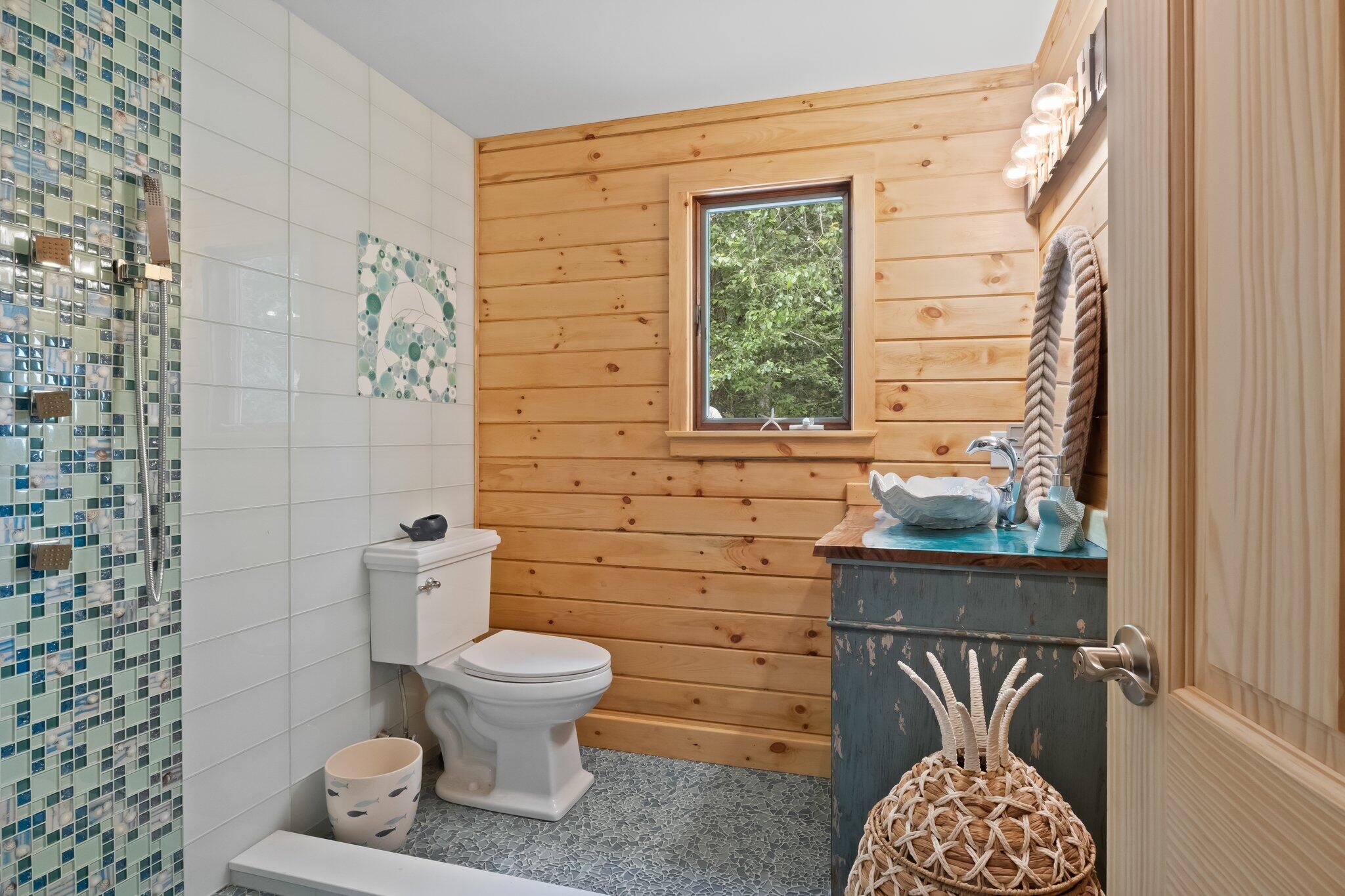45 Designers Road Wellfleet, MA 02667 - Photo 9 of 84 a bathroom with a toilet and a shower