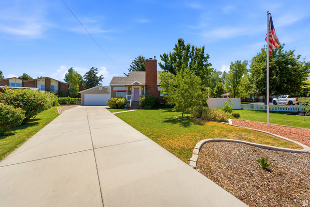 1925 South Main Street Bountiful, UT 84010 - Photo 6 of 48 Single-story residence featuring a brick chimney and a covered front porch