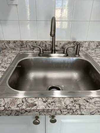 a close view of sink and tap