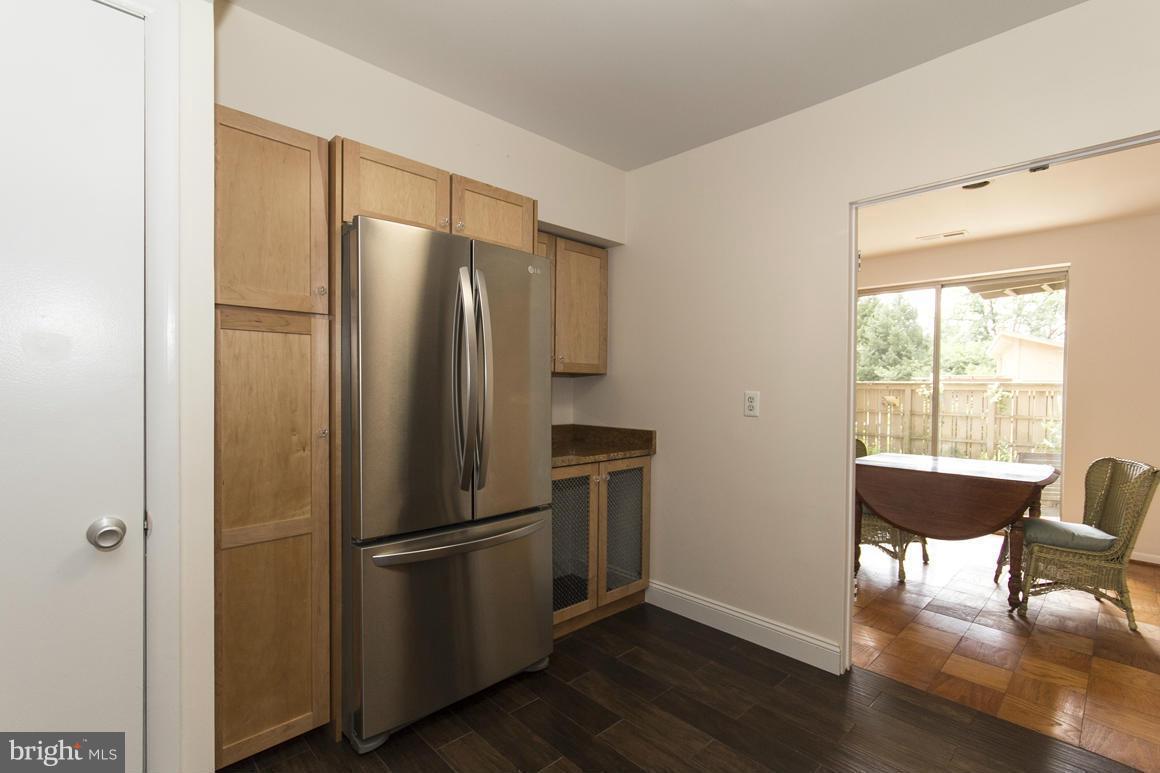 121 Cross Keys Road, Unit A Baltimore, MD 21210 - Photo 2 of 24 a metallic refrigerator freezer sitting in a kitchen