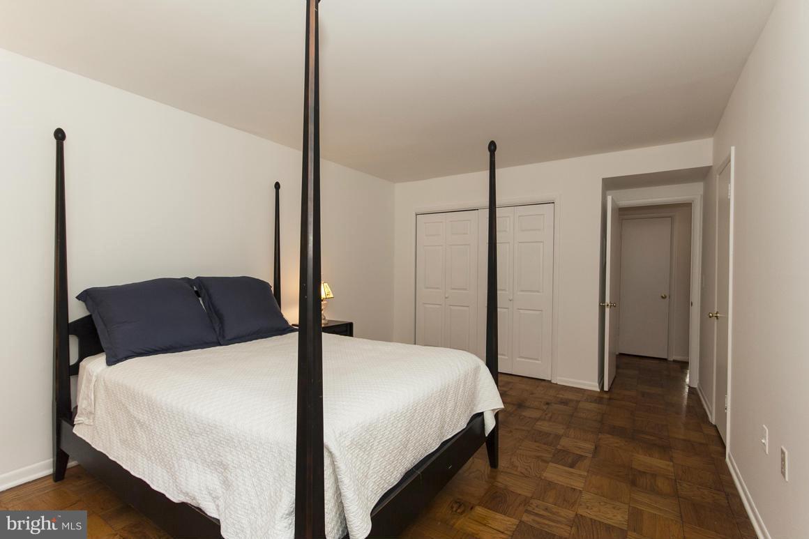 121 Cross Keys Road, Unit A Baltimore, MD 21210 - Photo 16 of 24 a bedroom with a bed and closet