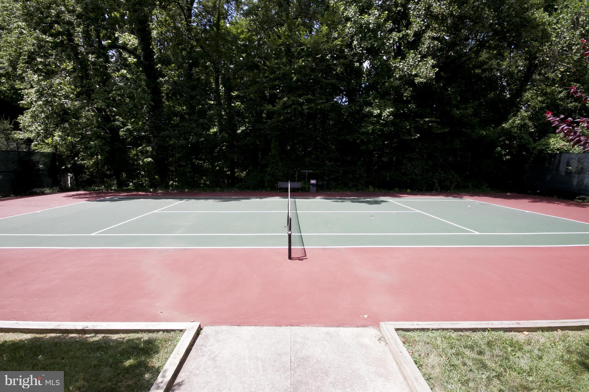 121 Cross Keys Road, Unit A Baltimore, MD 21210 - Photo 21 of 24 a tennis court that has tennis net