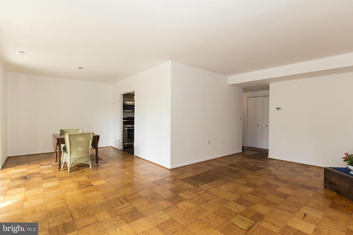 121 Cross Keys Road, Unit A Baltimore, MD 21210 - Photo 9 of 24 a view of a livingroom with chairs