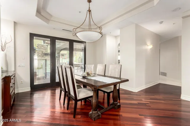 a large kitchen with stainless steel appliances granite countertop a sink stove and refrigerator