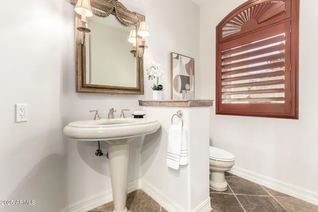 a view of a kitchen cabinets and a wooden floor