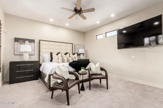 a large kitchen with stainless steel appliances kitchen island granite countertop a sink and cabinets