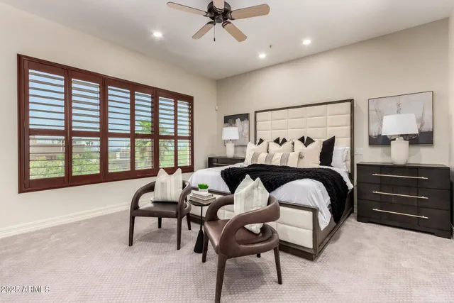 a bathroom with a sink a mirror and shower