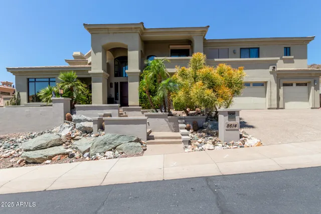 a living room with furniture fireplace and window