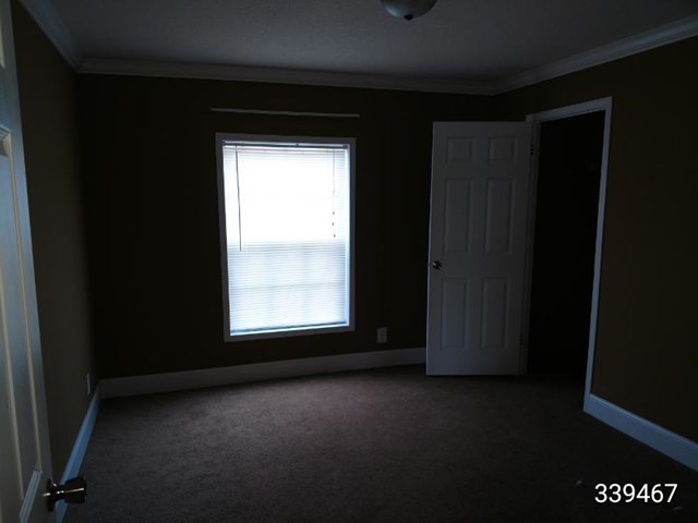 139 Roy Bryant Road Cochran, GA 31014 - Photo 5 of 14 a view of empty room with window