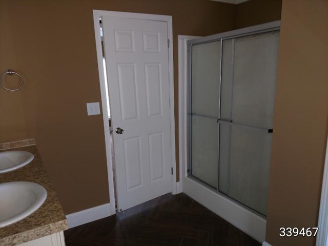 139 Roy Bryant Road Cochran, GA 31014 - Photo 6 of 14 a view of elevator with wooden floor