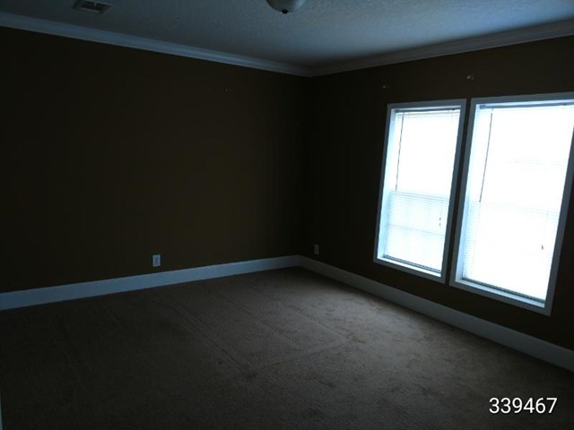 139 Roy Bryant Road Cochran, GA 31014 - Photo 9 of 14 a view of room with window