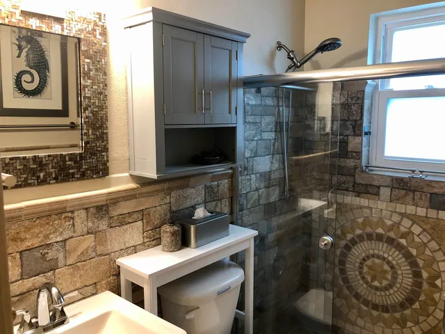 a bathroom with a sink and a mirror